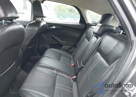 2014 Ford Focus Titanium z USA, uszkodzony, nr VIN 1FADP3N24EL380089